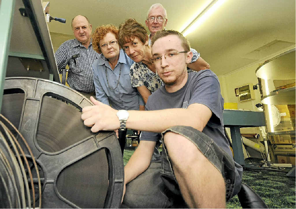 ON A DEADLINE: Volunteer board members of the Kyogle Community Cinema (from left) James Crawter, Kay Crawter, Dianne Bells and Peter Baxter with projectionist Michael Knight, prepare reels of 35mm film for screening on Friday night. ON A DEADLINE: Volunteer board members of the Kyogle Community Cinema (from left) James Crawter, Kay Crawter, Dianne Bells and Peter Baxter with projectionist Michael Knight, prepare reels of 35mm film for screening on Friday night.